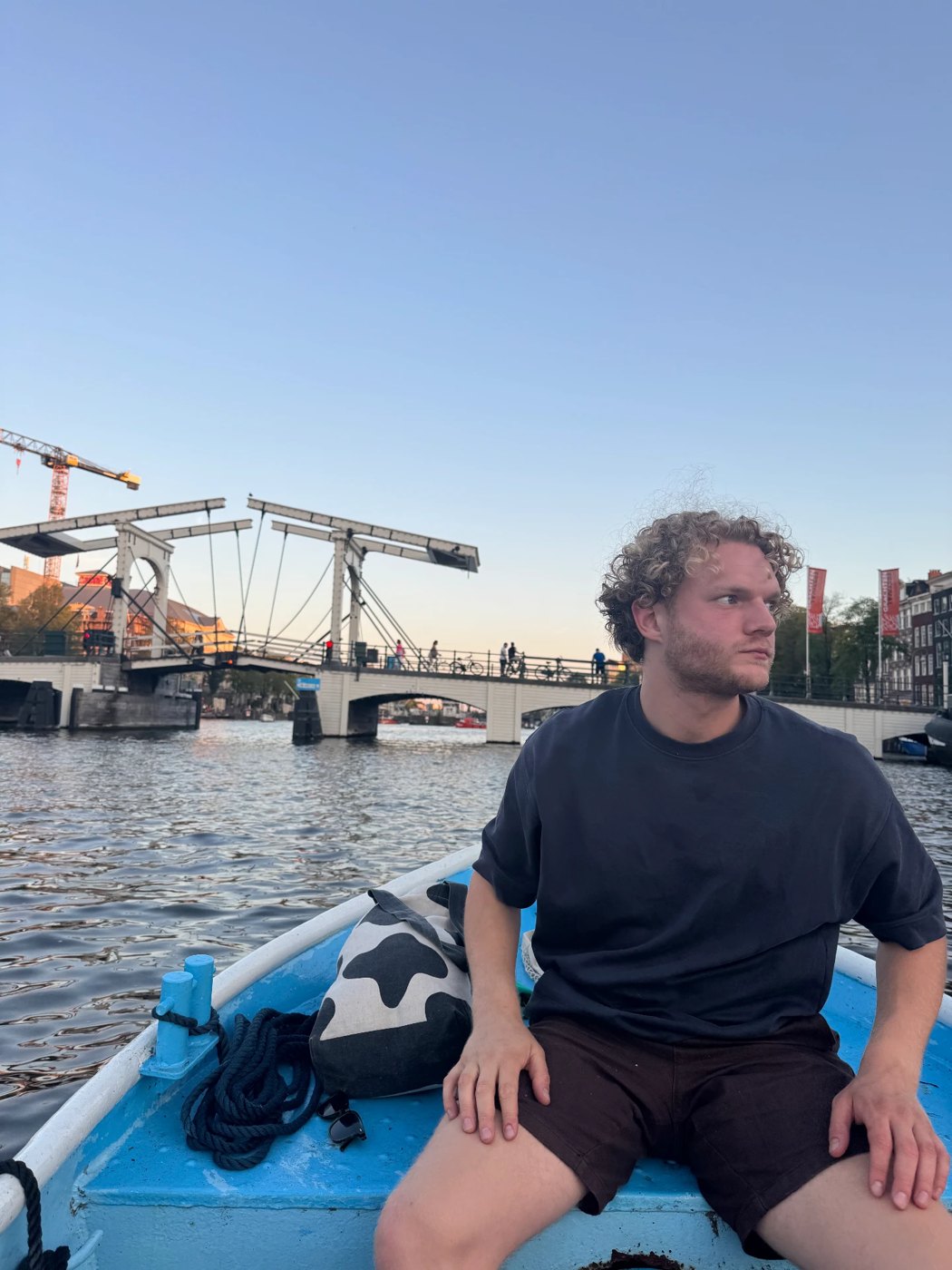 Waiting in the boat near the Magere Brug at dusk