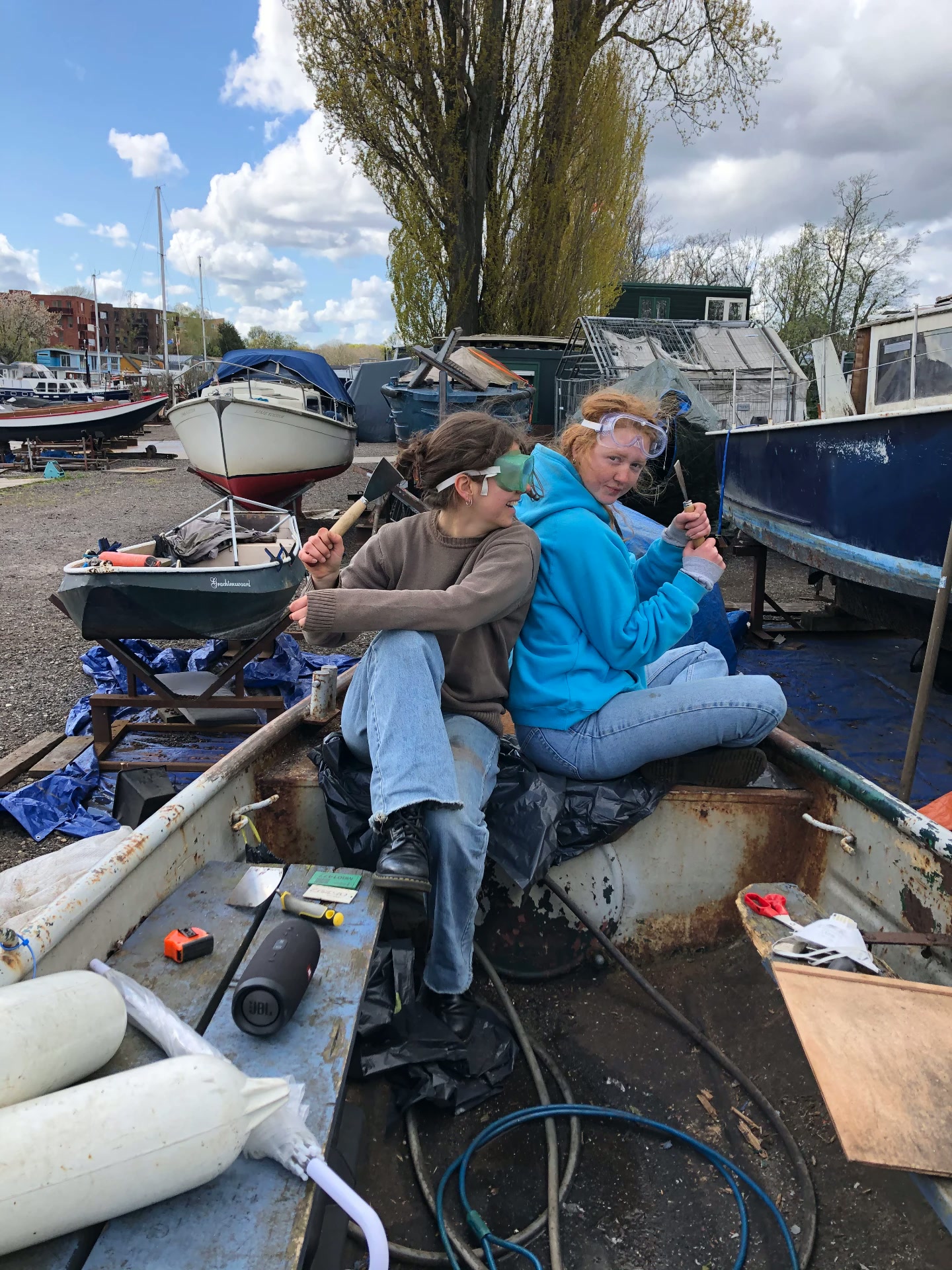 Working on the boat at the wharf on a spring afternoon
